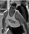 Kevin Carano runs a relay race.