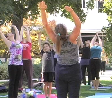 Community gathers to do yoga