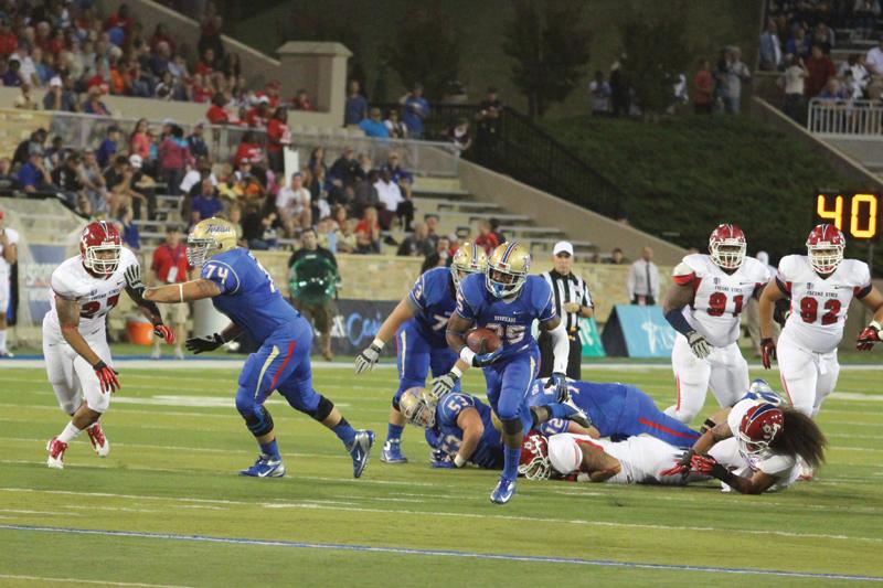 Running back Ja’Terian Douglas splits the Fresno State defense for a 32-yard run for a touchdown. Douglas had 56 total rushing yards in last Saturday’s game.
Photo courtesy of Jill Graves / The Tulsa Collegian