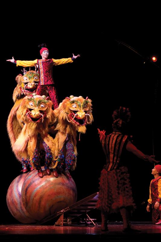 During Cirque du Soleil’s performance, “Dralion,” Yao, the god of fire, played by Dante Adela, presents an acrobat balancing on three dralions to conclude the first half of the show.