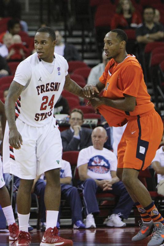 Kevin Foster fights for position against a Sunbird defender in the ’Dogs’ 102-57 exhibition win over Fresno Pacific Universtiy Oct. 30. Foster led all Fresno State players Friday in the win over Pacific with 15 points and 10 rebounds.
Photos by Michael Price / The Collegian