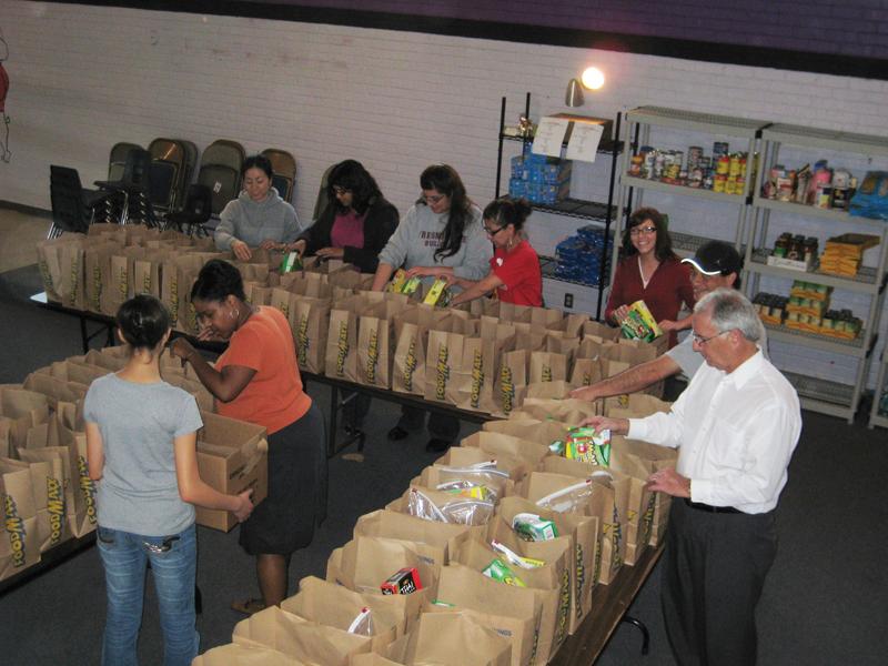For more than five years, volunteers have gathered at the Bulldog Pantry every Friday night to pack bags of food for more than 200 families. The pantry also serves low-income students in need of aid.
