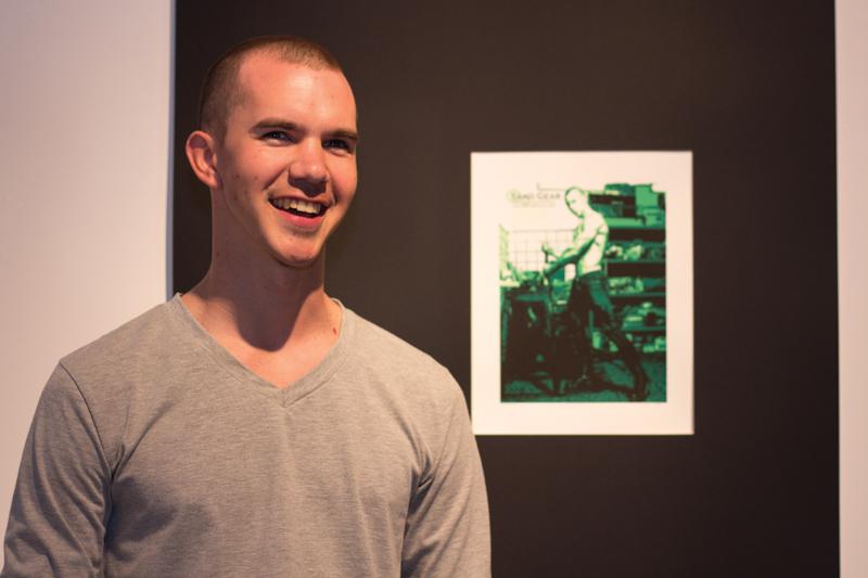 Art+student+Kyle+Hailey+is+demonstrating+his+art+pieces+at+the+Conley+Art+Gallery+as+part+of+his+graduate+degree.+Haileys+gallery+consists+of+prints+parodying+modern+advertising.+
