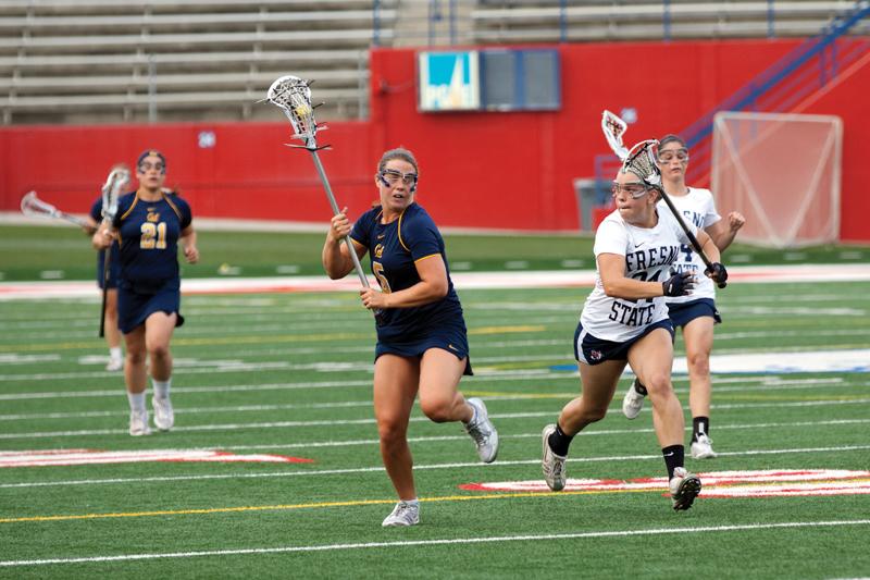 Defender Sophie Walker (24) chases Cal attacker Brynn Gasparino (5) during the Bulldogs’ 16-8
loss to the Golden Bears on Tuesday at Bulldog Stadium. Khlarissa Agee / The Collegian