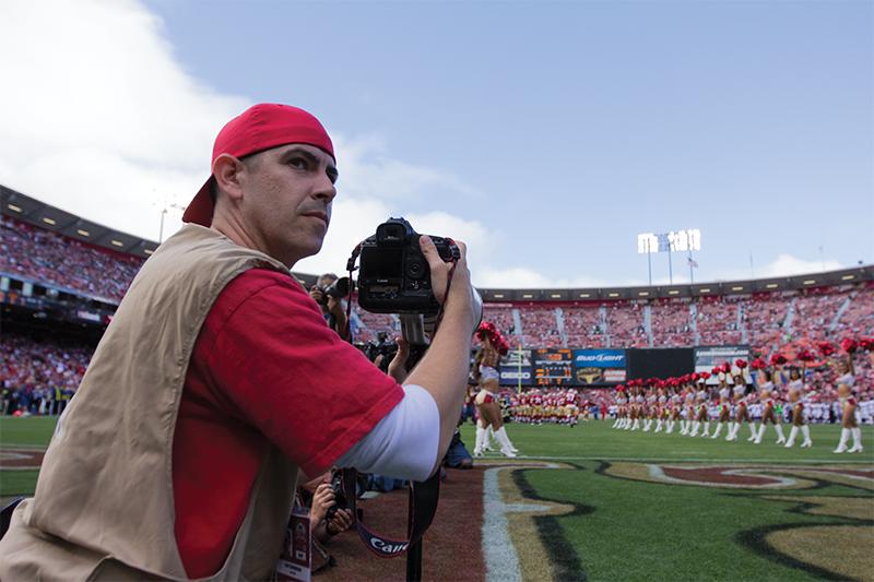 Cary Edmondson shooting at a recent 49ers vs. Vikings game in San Francisco at Candlestick Park on Aug. 25. Photo by Roe Borunda
