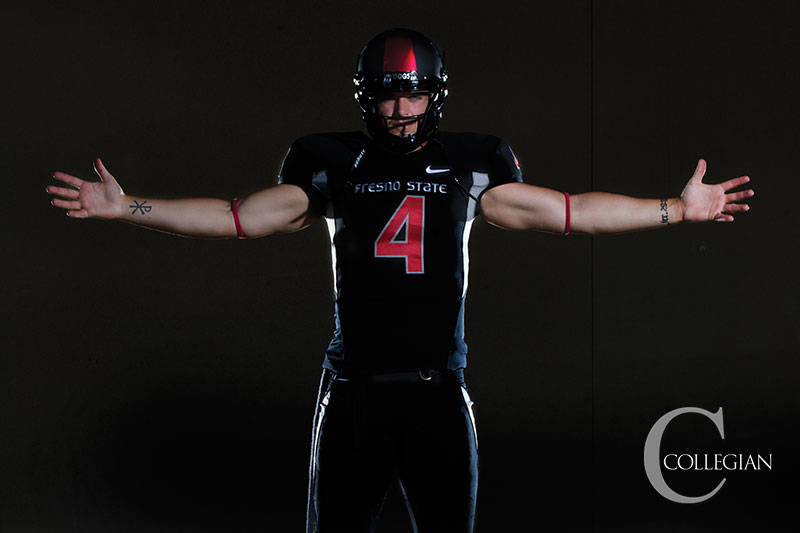 Fresno State quarterback Derek Carr and the Bulldogs will debut their highly anticipated all-black uniforms Saturday night against Nevada at a sold-out Bulldog Stadium. 