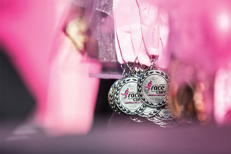 Photo by Roe Borunda/The Collegian

The top finishers in Saturdays Susan G. Komen Race for the Cure 5K run received medals after their race.
