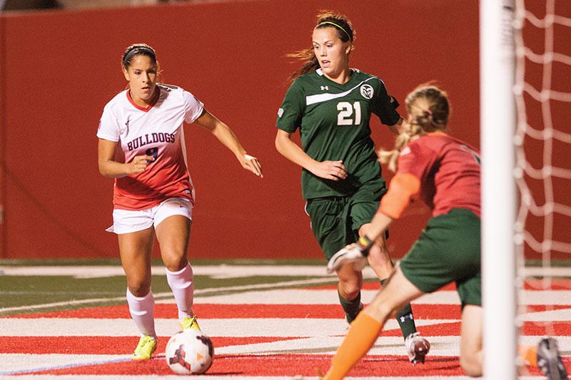 Fresno State senior Morgan Castain (9) takes the ball to Colorado State’s goal during the Bulldogs’ 3-0 victory over the Rams. Castain scored three goal in her last home game as a Bulldog. Photo by Melinda Ortiz/The Collegian