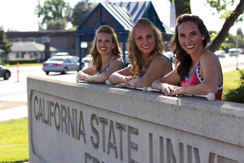 Photo courtesy of Alex Ottoboni

The three feature twirlers before the Boise State game. The twirlers will head to Missouri in the spring to compete in college nationals. 