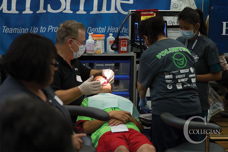 Roe Borunda / The Collegian 

For families who qualified, dental services at Saturday’s TeamSmile event in the South Gym inculded x-rays, teeth cleaning, cavitity fillings and extractions.
