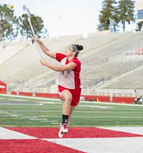 Fresno State lacrosse standout Kara Concheck receives a pass during a Bulldogs practice. Photo by Katie Eleneke/The Collegian