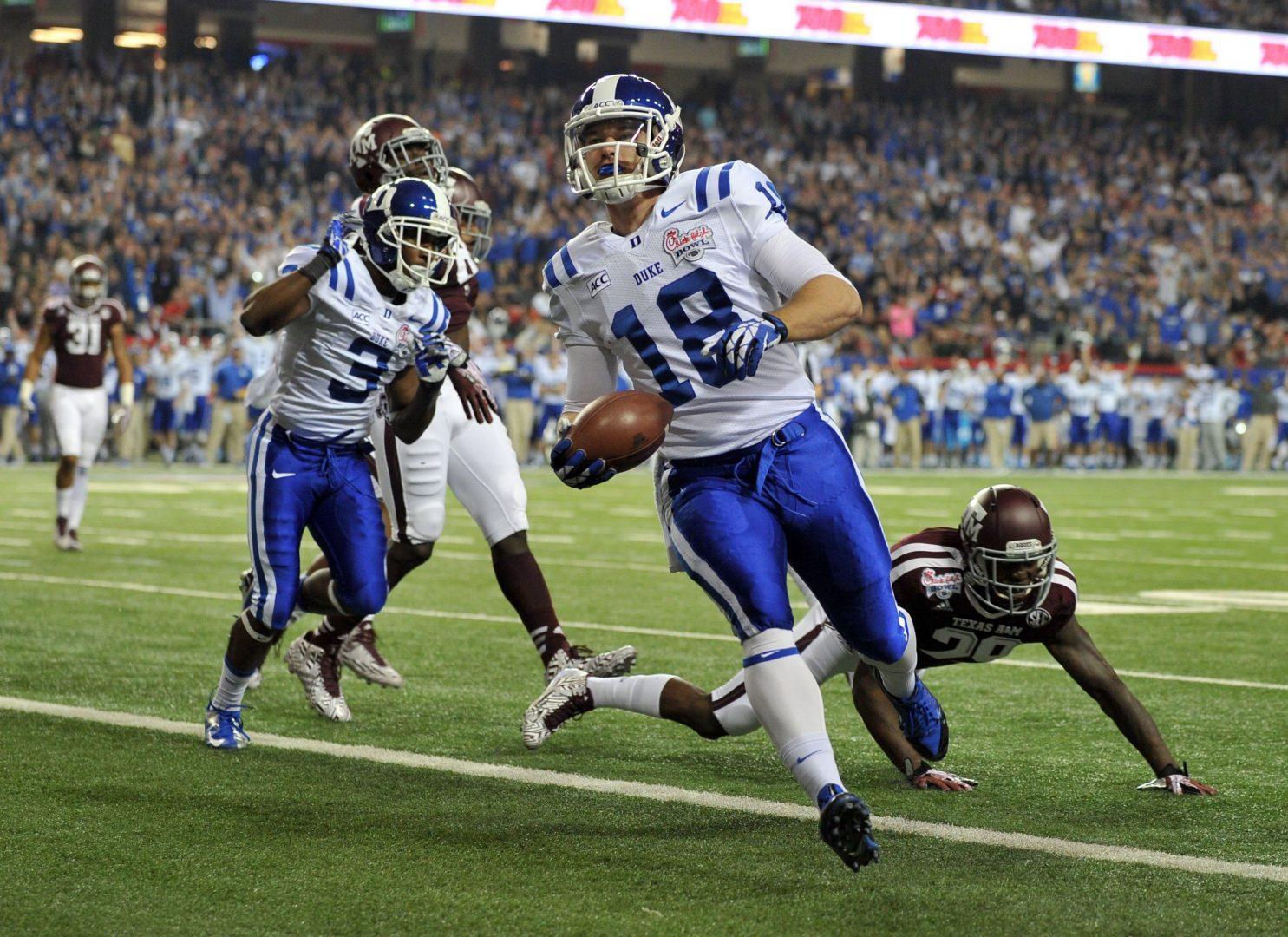 Quarterback Brandon Connette, shown here as a Duke Blue Devil, scores against the Texas A&M Aggies during the first quarter of the Chick-fil-A Bowl at the Georgia Dome in Atlanta on Tuesday, Dec. 31, 2013. Fresno State signed Connette last Friday. Photo by Brant Sanderlin/McClatchy-Tribune