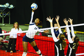 Fresno State outside hitter Zana Bowens goes for a kill during the 2013 season. Bowens is one of eight Bulldogs returning for the 2014 season.  Photo by Khlarissa Agee/Collegian File Photo