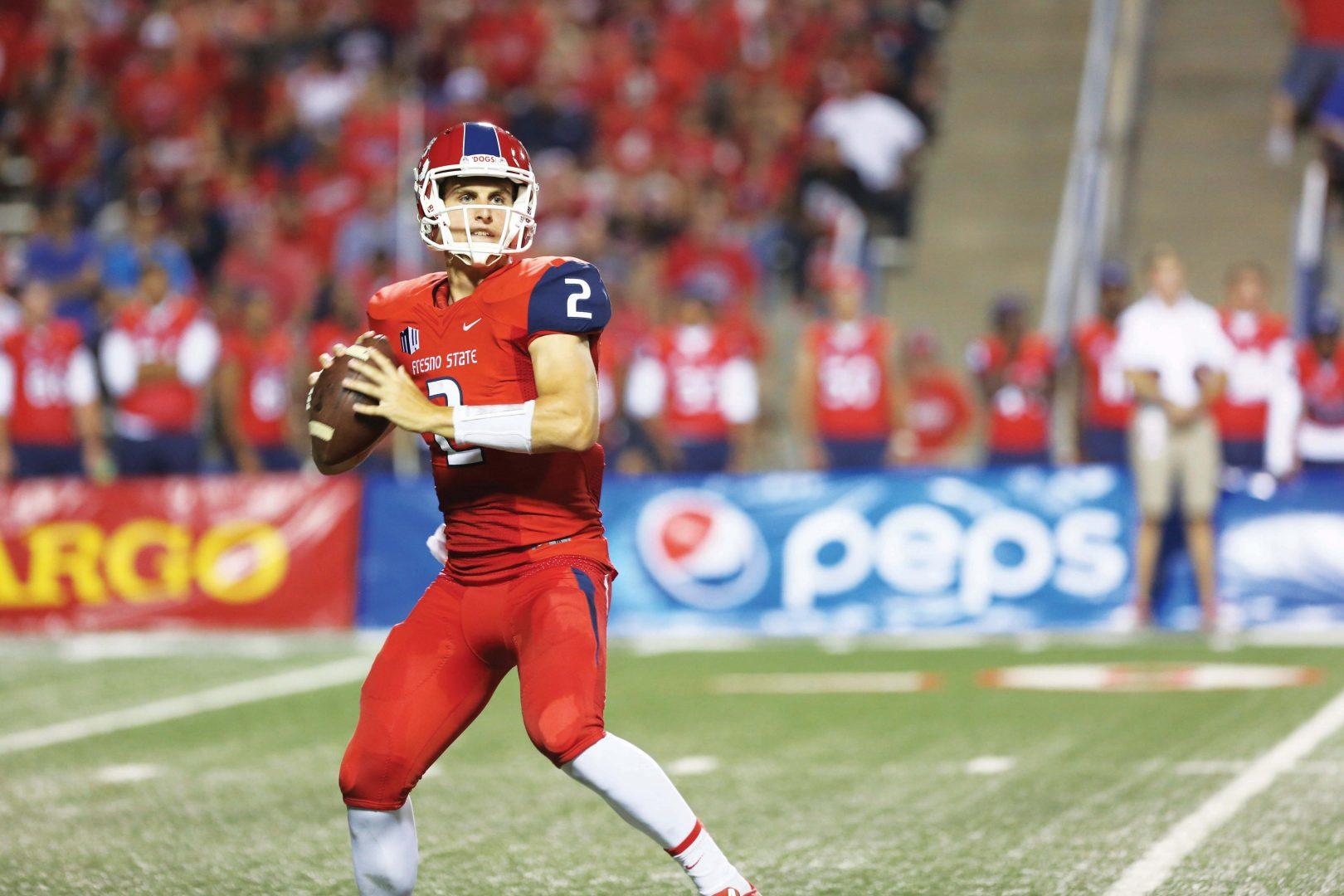 Fresno+State+quarterback+Brian+Burrell+scans+the+backfield+during+the+Bulldogs+55-19+loss+to+Nebraska.+Photo+by+Khlarissa+Agee%2FThe+Collegian