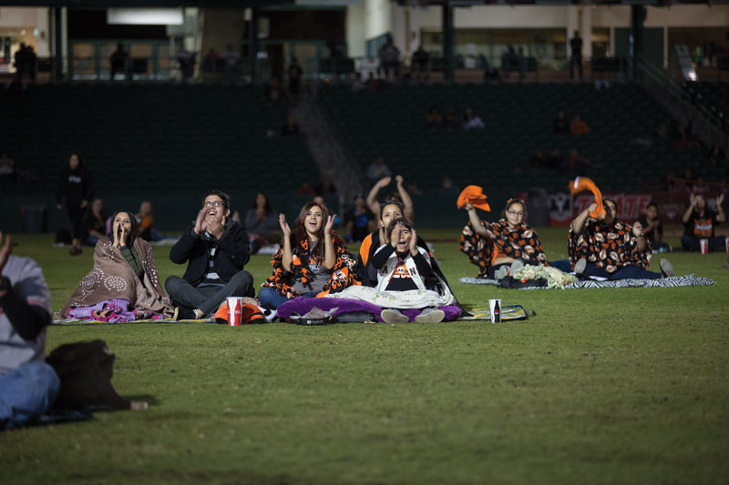 (From left to right) Ariana Orozco, Diego Orozco, Adriana Orozco, Laura Orozco and Lori Rocha cheer as the San Francisco Giants keep the Royals at bay Wednesday night at Chukchansi Park. Photo by Logan Downing/The Collegian