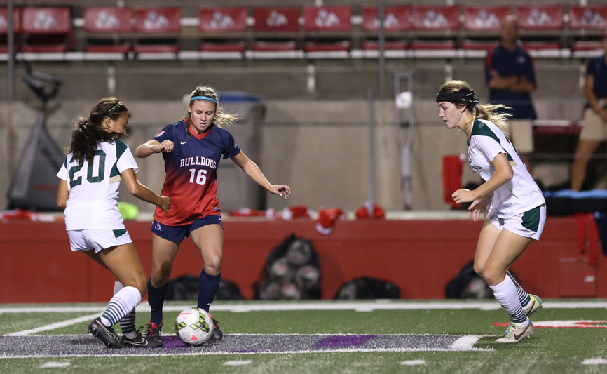 Fresno State forward Peyton Cline controls the ball during the Bulldogs’ loss to the Sacramento State Hornets Sept. 21. The Bulldogs beat UNLV and Nevada for their first conference wins of the season last weekend. Photo by Khlarissa Agee/The Collegian