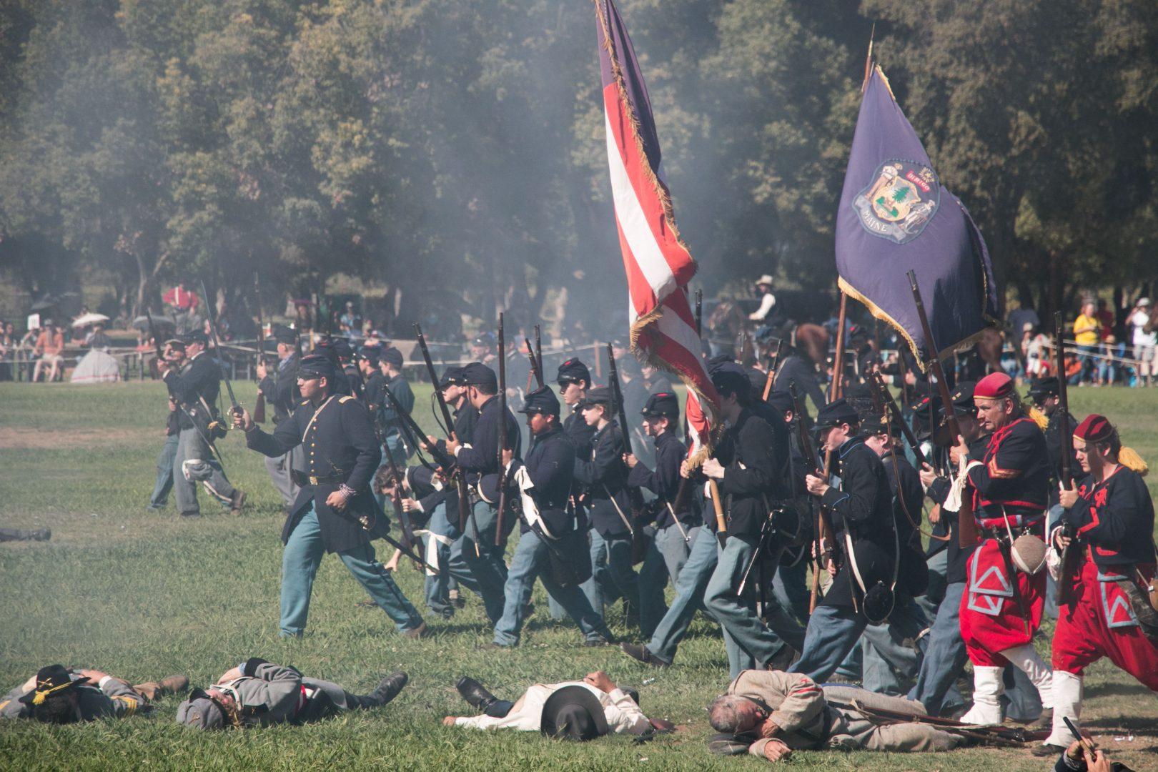 Re-enactors stage a battle at Kearney Park this weekend for the 25th annual Civil War Revisited, the largest Civil War re-enactment in California. 