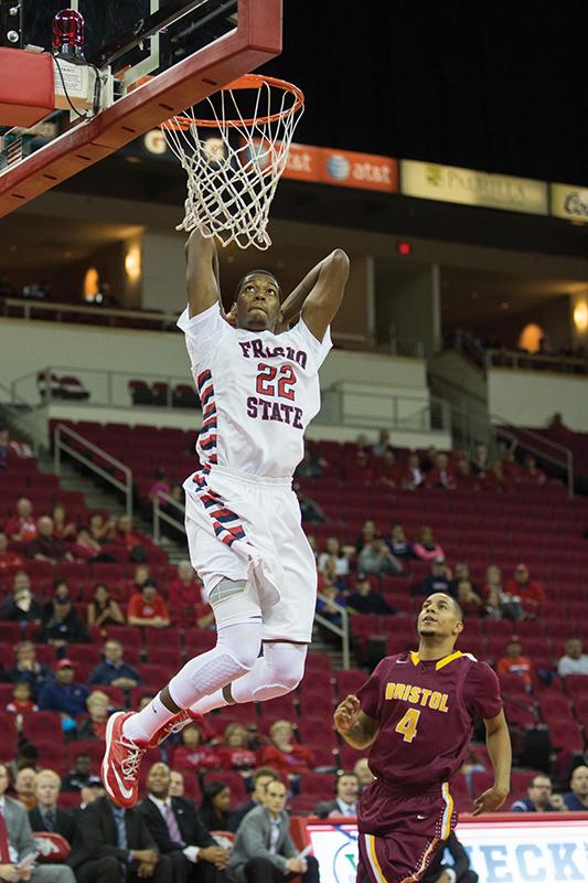 Fresno State forward Paul Watson finishes a fast break play with a dunk during the Dogs 93-55 victory over the Bristol University Bears Monday night at the Save Mart Center. Photo by (Logan Downing/The Collegian)