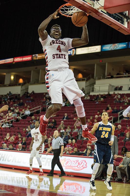 Fresno State forward Karachi Edo slams one in toward the end of the Dogs victory over UC Irvine Wednesday at the Save Mart Center. Photo by Darlene Wendels/The Collegian