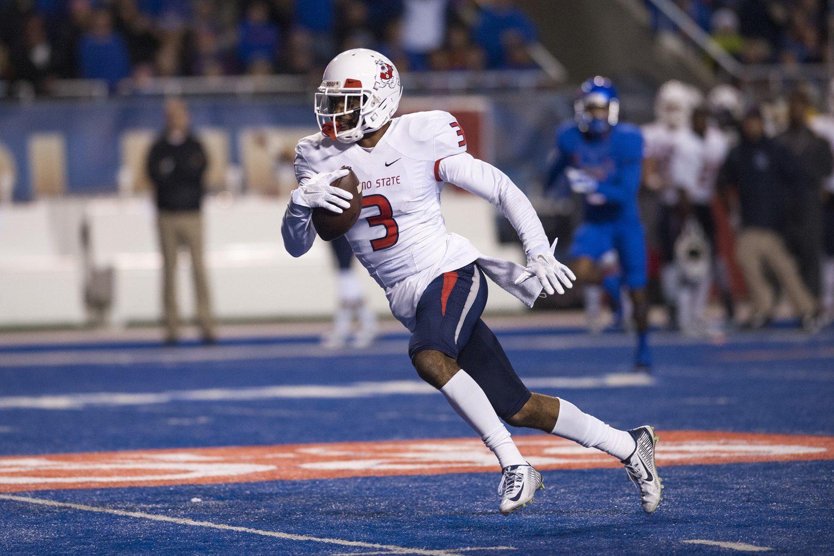 Fresno State wide receiver Josh Harper sprints after receiving a pass at Albertsons Stadium in Boise, Idaho, during the Dogs 28-14 loss to the Broncos on Saturday. (Photo courtesy of NCAA Photos)
