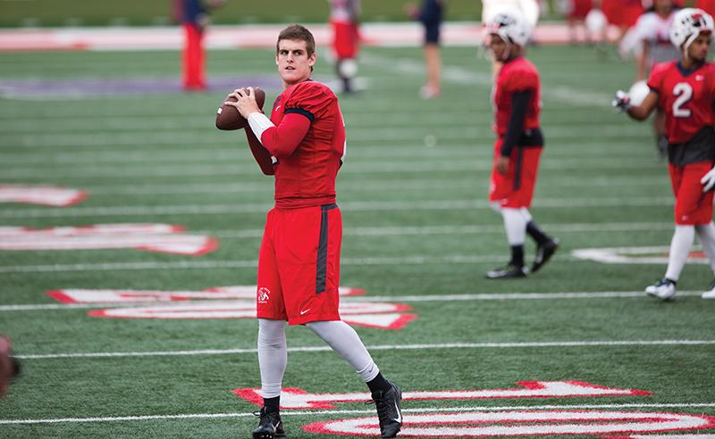 Fresno State quarterback Brian Burrell practices for the Mountain West Championship game that will take place Saturday at Albertsons Stadium in Bouse, Idaho. Photo by Darlene Wendels/The Collegian