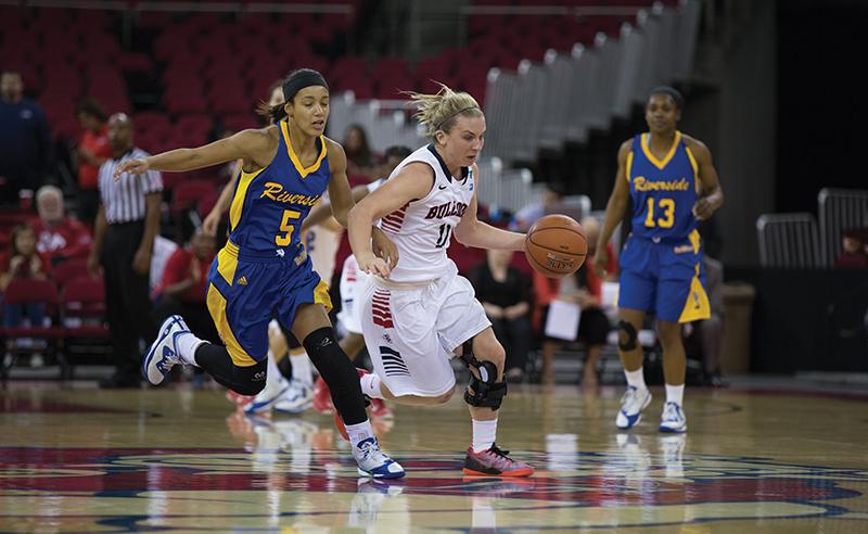 Fresno+State+guard+Alex+Furr+dribbles+past+UC+Riverside+defenders+during+the+Dogs+73-61+victory+over+the+Highlanders+on+Dec.+4.+Photo+by+Darlene+Wendels%2FThe+Collegian