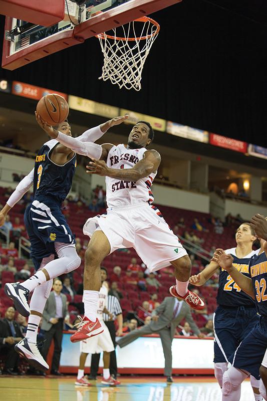 Fresno State guard  Darnell Taylor (1) attempts a layup in last weeks 72-63 win over UC Irvine. Photo by Darlene Wendels/The Collegian