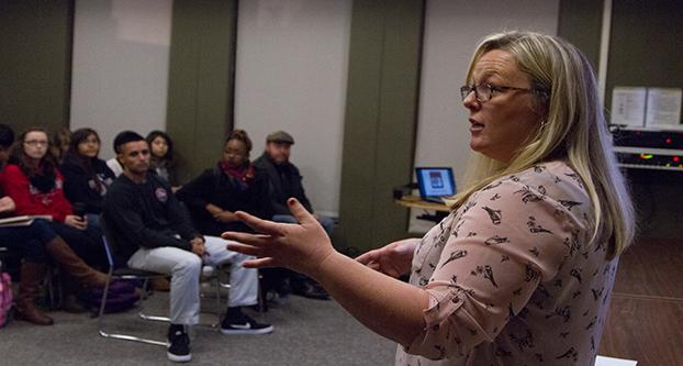 Coordinator Jessica Adams with the Women’s Resource Center explains the “It’s on Us” campaign to perspective participants during the audition information session at the university student union on Thursday. 
