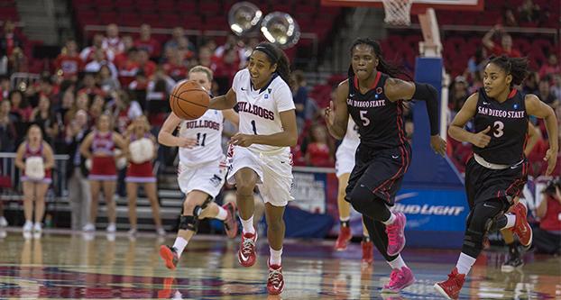 Fresno State guard Raven Fox (1) takes the ball downcourt during the Dogs 57-50 victory over the San Diego State Aztecs Wednesday at the Save Mart Center. (Paul Schlesinger/The Collegian)