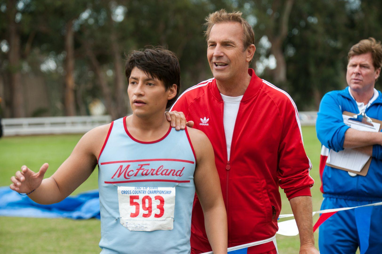 Left to right: Thomas Valles (Carlos Pratts) and Coach Jim White (Kevin Costner) 