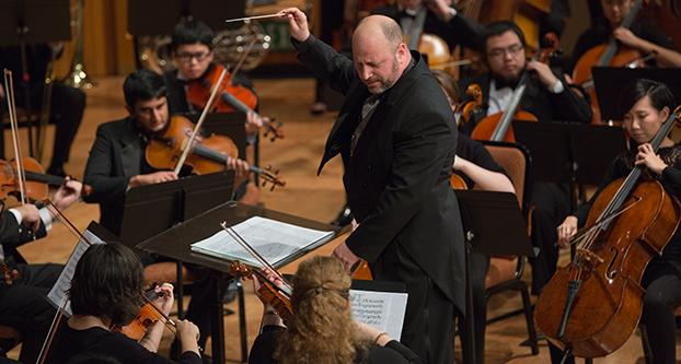 Darlene Wendels / The Collegian
Conductor Thomas Loewenheim leads the Fresno State Gala Orchestra, a faculty-student orchestral collaboration, during a performance of Aram Khachaturian’s “Nocturne” for the Faculty Gala Concert held in the Music Foyer on campus Saturday.