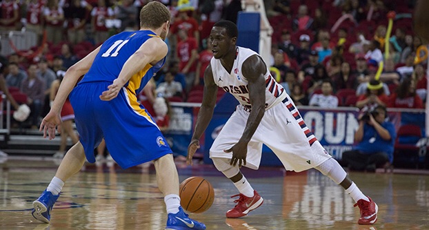 Fresno State guard Emmanuel Owootoah (right) stares down San Jose State guard Danny Mahoney during the Dogs victory over the Spartans Wednesday at the Save Mart Center. (Darlene Wendels/The Collegian)