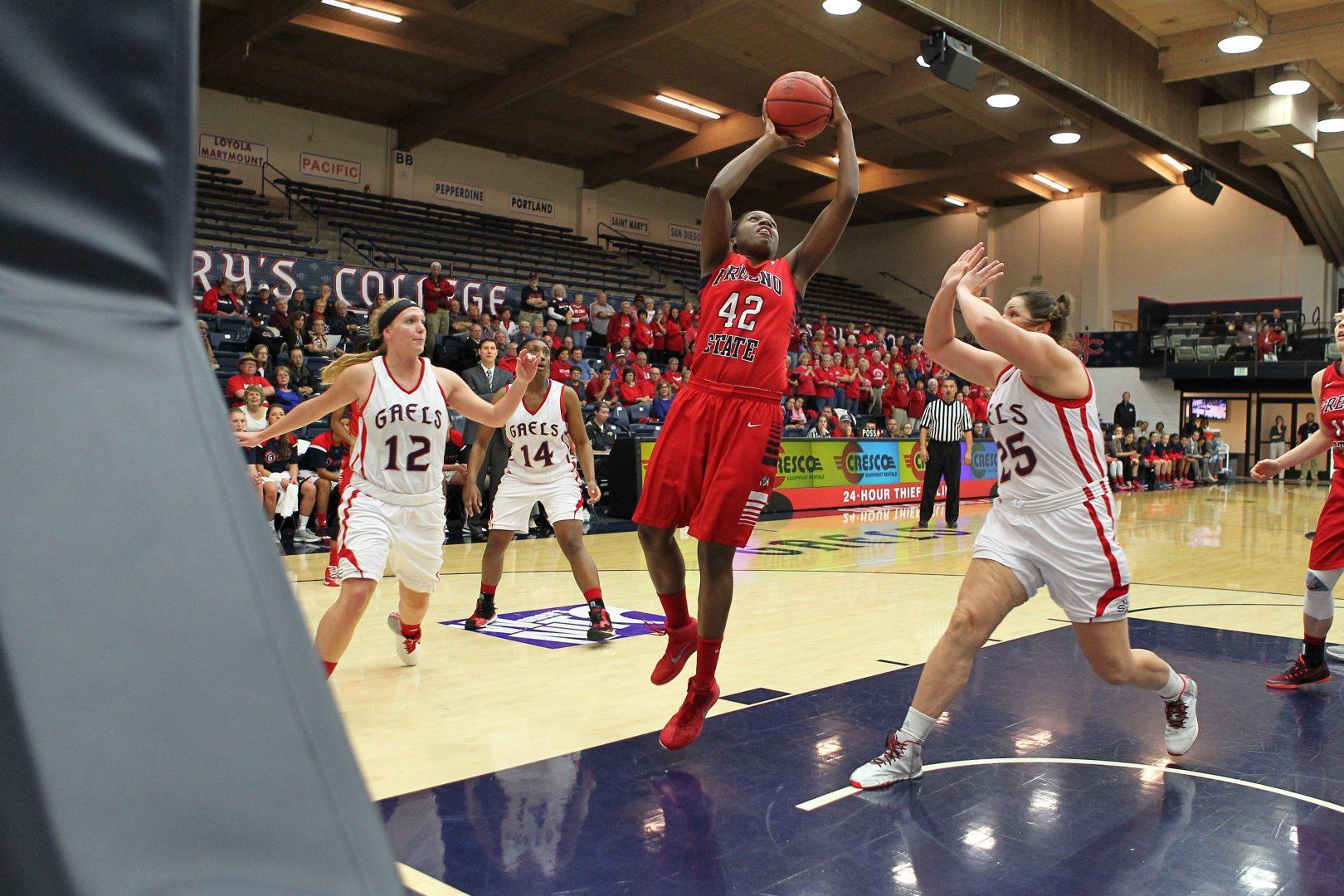 Fresno State center Toni Smith goes for a layup during Mondays 83-64 loss to Saint Marys in the second round of the WNIT. (Photo courtesy of Saint Marys Athletics)