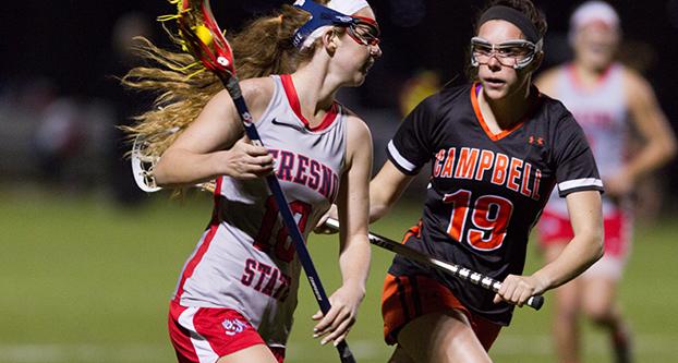 Fresno State sophomore midfielder Kyleigh Westgarth (18) battles Campbells Erin OHara during Wednesdays 13-11 win over the Camels.