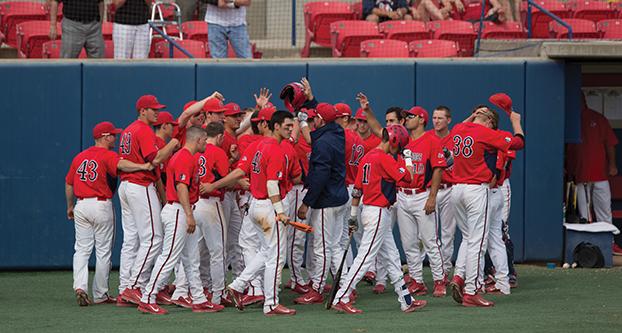 The Fresno State baseball team huddles up after sweeping San Jose State in a three-game weekend series on March 22 at Pete Beiden Field. The Bulldogs host San Diego State this weekend for a three-game slate. (Darlene Wendels/The Collegian)