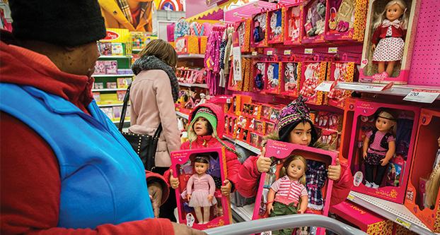 Diane Shannon shops for toys on Black Friday with her daughter Davadia, 5, right, and Darladia, 4, at Target on 1200 N. Larrabee on Friday, Nov. 28, 2014 in Chicago. (Zbigniew Bzdak/Chicago Tribune/TNS)