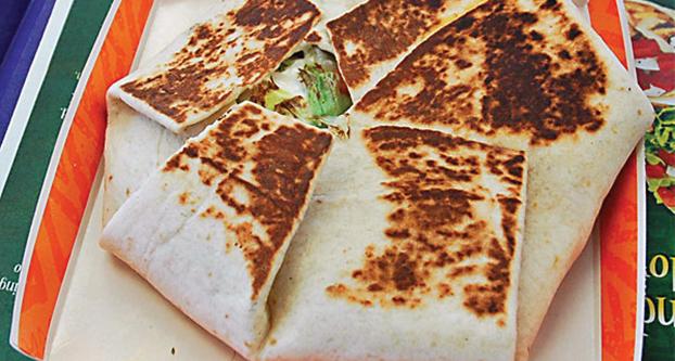 Crunchwrap supreme, the ultimate Taco Bell experience for college students on a budget.
(Fat Louie, Creative Commons) 