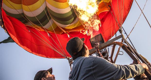 In Old Town Clovis, crowds waits for the hot air balloons to take flight during the ClovisFest Sept. 19, 2015. (Khone Saysamongdy The Collegian)