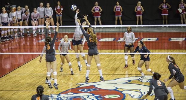 Fresno State freshman Taylor Slover goes in for a kill during the ‘Dogs’ 3-0 sweep of Fresno Pacific Tuesday night at Save Mart Center. (Khone Saysamongdy/The Collegian)
 