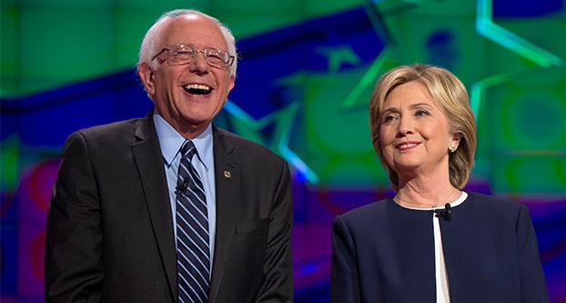 Bernie Sanders and Hillary Clinton on the debate stage on Tuesday, Oct. 13, 2015, in Las Vegas. Brian Cahn/Zuma Press/TNS