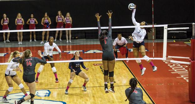 Fresno State junior outside hitter Aleisha Coates (3) goes in for the spike during Tuesday night’s game against the UNLV Rebels at the Save Mart Center. (Khone Saysamongdy/The Collegian)