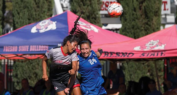 Fresno State sophomore midfielder Maria Gomez goes in for a header during her team’s Oct. 11 win over the Air Force Falcons. (Darlene Wendels/The Collegian)