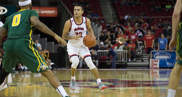 Fresno State senior guard Cezar Guerrero pulls up for a 3-point shot during Thursday’s 78-71 win over San Francisco at Save Mart Center. (Khone Saysamongdy/The Collegian)