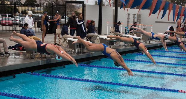 Fresno State and San Jose State swimmers compete in Saturday’s meet at the Aquatics Center. (Darlene Wendels/The Collegian)