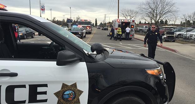Traffic was blocked on the westbound side of Barstow Avenue, just east of Cedar Avenue, for a short time Tuesday after a Fresno State student was struck by a golf cart while he was crossing the street from Parking Lot P20, police said. (Paul Schlesinger/The Collegian)