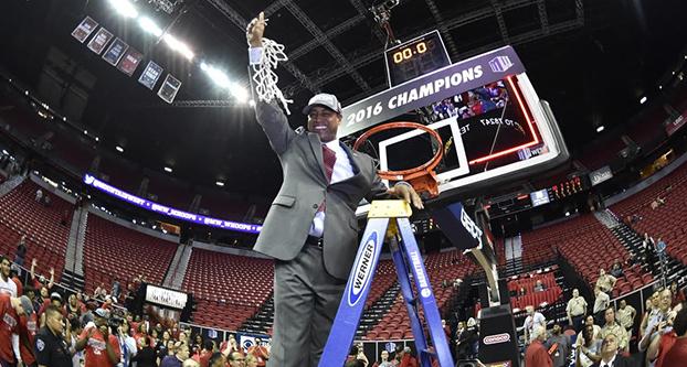 Fresno State head coach Rodney Terry smiles after cutting down the nets following the Bulldogs’ 68-63 win over San Diego State in the the Mountain West Tournament title game on Saturday, March 12, 2016 at the Thomas & Mack Center in Las Vegas. (Steve Nowland/NCAA Photos)