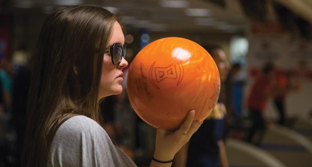 Fresno State student Shaela Warkentin, 19, holds her bowling ball as she approaches the lane during coach Don Duncan’s Bowling 101 class, held at Bulldog Bowl, Tuesday, Feb. 16, 2016. Warkentin who was blinded in a car accident in 2011, is the first blind student to enroll in the class in Duncan’s 16 years of teaching