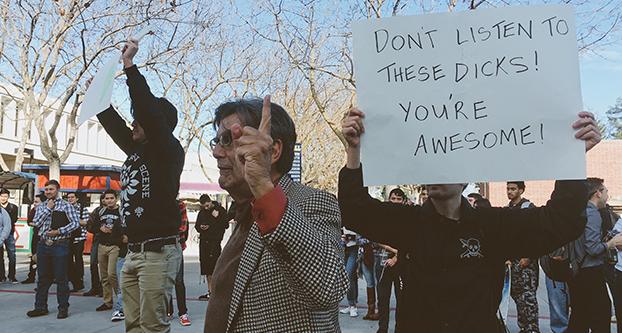 Fresno State students protest the Evangelical preachers that came to the Free Speech Area on Tuesday, Mar. 8, 2016.
(Photo credit to Cinthia Quesada)