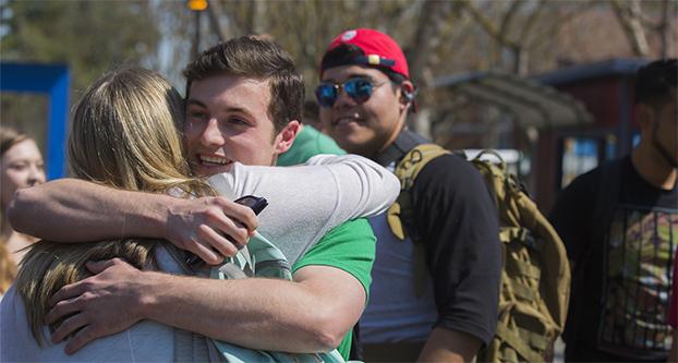 ASI President Elect Tim Ryan, hugs ASI President Abigail Hudson, after election results were announced in the Free Speech Area, Thursday, March 17, 2016.  