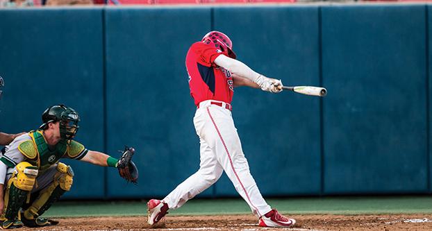 A Fresno State batter swings at a pitch during a nonconference home game against Sacramento State on Wednesday, April 6. (Ricky Gutierrez/The Collegian)